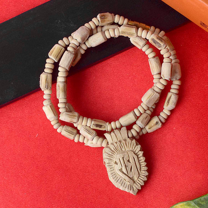 100% Original Holy Tulsi Mala with Radha Locket, made from authentic Tulsi beads, ideal for spiritual practices and meditation. This mala is a symbol of devotion, bringing peace and blessings. India’s Largest Pooja Accessories Brand – www.satvikworld.com