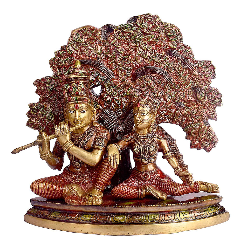 11.8 Inch Shree Radha Krishna Sitting Under Tree Brass Statuefeaturing intricate detailing, perfect for spiritual home decor, temple worship, and devotional gifting. India’s Largest Brass Idols Brand - www.satvikworld.com
