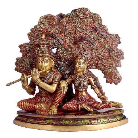 11.8 Inch Shree Radha Krishna Sitting Under Tree Brass Statuefeaturing intricate detailing, perfect for spiritual home decor, temple worship, and devotional gifting. India’s Largest Brass Idols Brand - www.satvikworld.com
