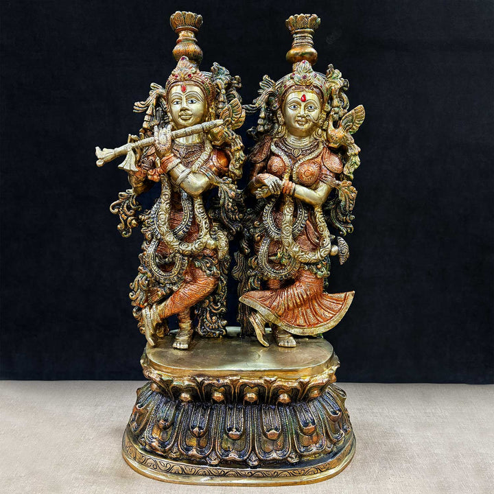 12 Inches Stunning Radha Krishna Brass Idol – A beautifully detailed brass statue of Radha and Krishna, symbolizing divine love and harmony. Ideal for adding a sacred touch to your home decor or temple. India’s Largest Pooja Accessories Brand – www.satvikworld.com