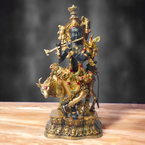 17 Inch Brass Krishna Statue with Cow – A divine and beautifully crafted brass statue of Lord Krishna playing his flute, accompanied by a cow, symbolizing his pastoral life and devotion. Perfect for home décor and spiritual spaces. India’s Largest Pooja Accessories Brand – www.satvikworld.com