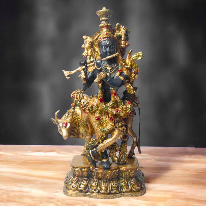17 Inch Brass Krishna Statue with Cow – A divine and beautifully crafted brass statue of Lord Krishna playing his flute, accompanied by a cow, symbolizing his pastoral life and devotion. Perfect for home décor and spiritual spaces. India’s Largest Pooja Accessories Brand – www.satvikworld.com