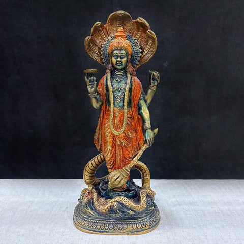 17 Inch Brass Vishnu Standing with Sheshanag – A majestic brass statue of Lord Vishnu standing gracefully with Sheshanag, perfect for adding divine energy to your home or temple décor. India’s Largest Pooja Accessories Brand – www.satvikworld.com