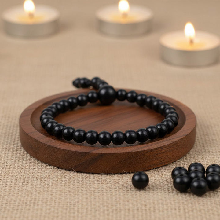 8mm government certified Karungali bracelet with gloss finish, suitable for daily wear, spiritual protection, and positive energy. India’s Premium Jap Mala Store - www.satvikworld.com