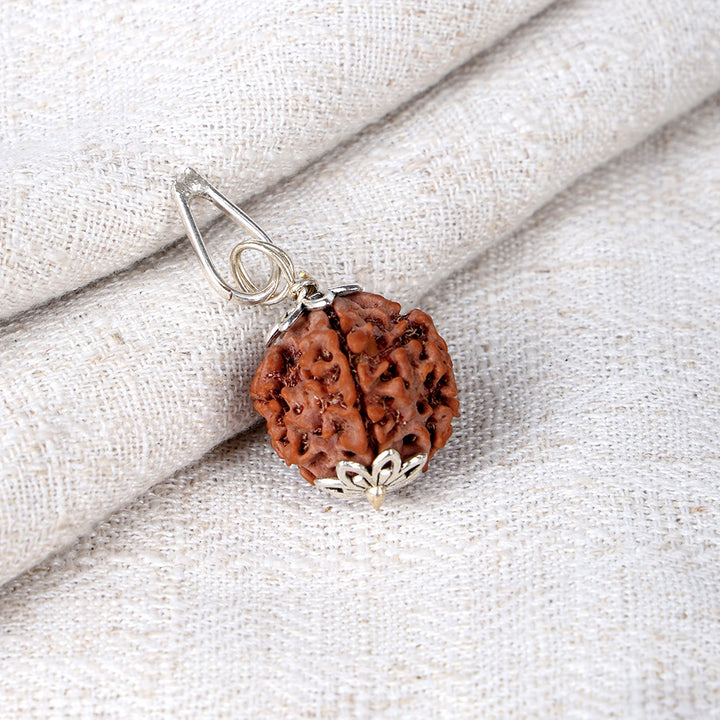 5 Mukhi Rudraksha Pendant with Designed Silver Cap and Hook for Spiritual Protection, Peace, and Positive Energy. 
India’s Largest Pooja Accessories Brand – www.satvikworld.com
