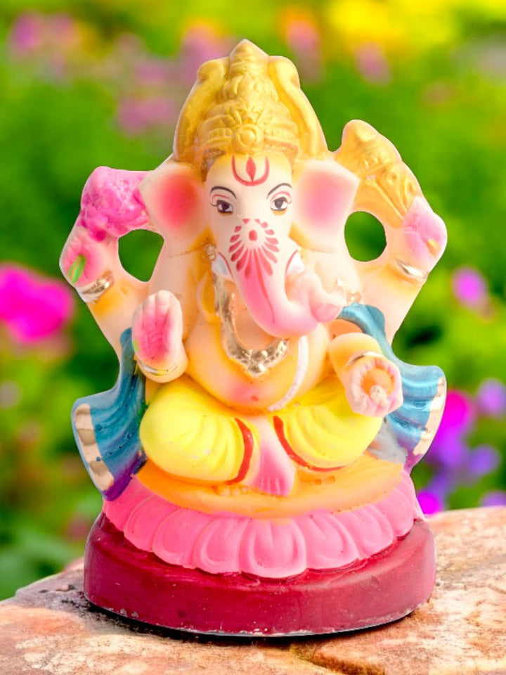 6.5-inch eco-friendly Shayana Ganesha idol in Padmasana pose, adorned with a red patka, handcrafted from natural clay and painted with organic colors India’s Largest Pooja Accessories Brand – www.satvikworld.com