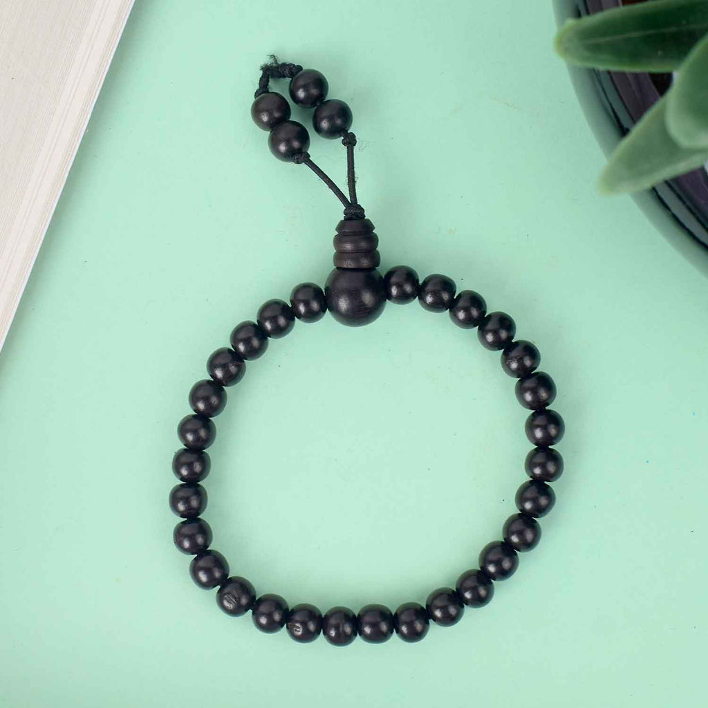 6mm Ebony Bracelet with Gloss Finish – sleek and polished black wooden bead bracelet for spiritual balance and style. India’s Largest Pooja Accessories Brand - www.satvikworld.com