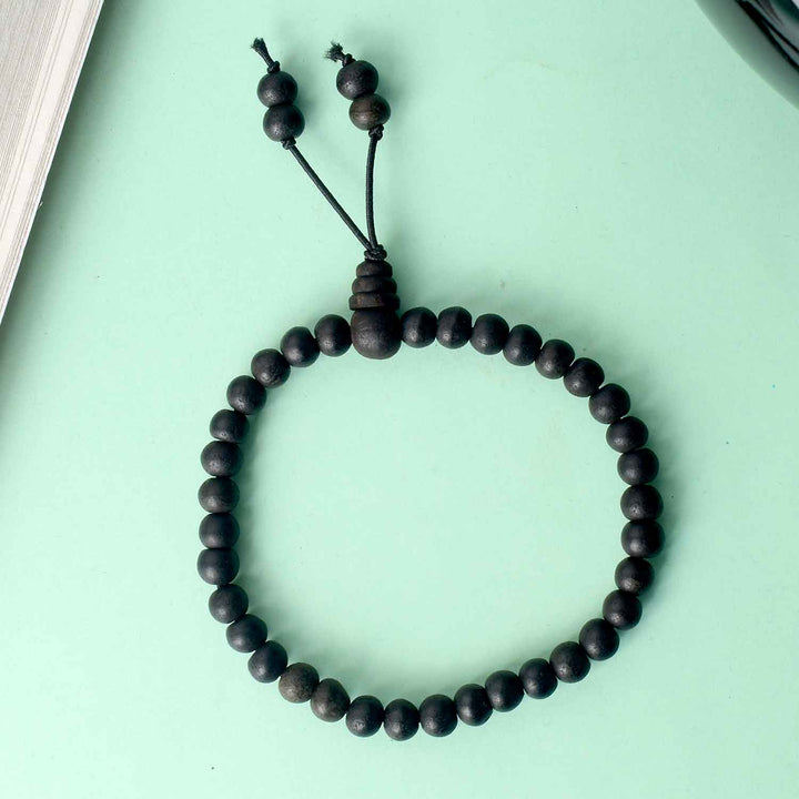 6mm Ebony Bracelet with Matte Finish – elegant black wooden bead bracelet with a smooth, non-reflective surface for a subtle and spiritual look. India’s Largest Pooja Accessories Brand - www.satvikworld.com