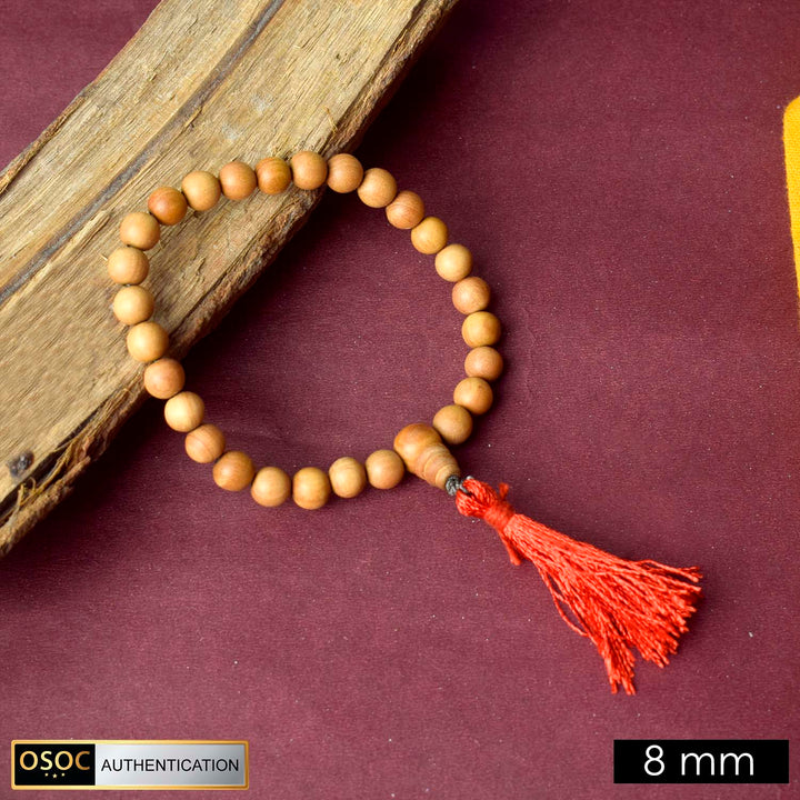 Beautiful handcrafted 8mm 27 Bead White Chandan Money Mala made from pure sandalwood beads for attracting wealth, prosperity, and spiritual calmness.India’s Premium Jap Mala Store - www.satvikworld.com
