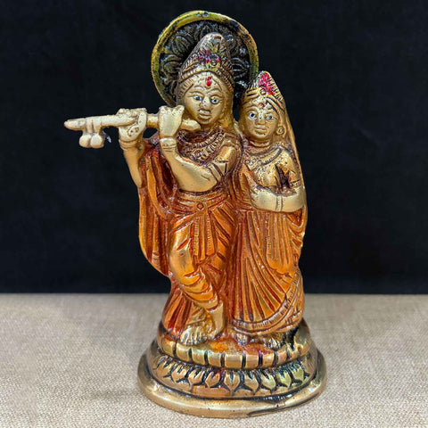 5.3-inch Radha Krishna pair idol, beautifully crafted in brass, depicting the divine love and harmony between Lord Krishna and Radha, symbolizing devotion and spiritual unity. Ideal for worship or home décor. India’s Largest Pooja Accessories Brand – www.satvikworld.com