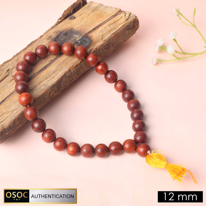 Authentic 12mm 27 Bead Red Chandan Money Mala crafted from pure red sandalwood for prosperity, spiritual power, and meditation rituals. India’s Premium Jap Mala Store - www.satvikworld.com
