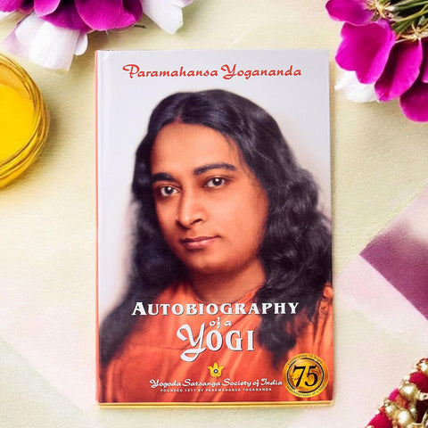 Autobiography of a Yogi (Yogi Kathaamrt) by Self Realization Fellowship, a spiritual classic that narrates the life journey of Paramahansa Yogananda, sharing profound insights into his experiences, teachings, and the path to self-realization. India’s Largest Pooja Accessories Brand – www.satvikworld.com