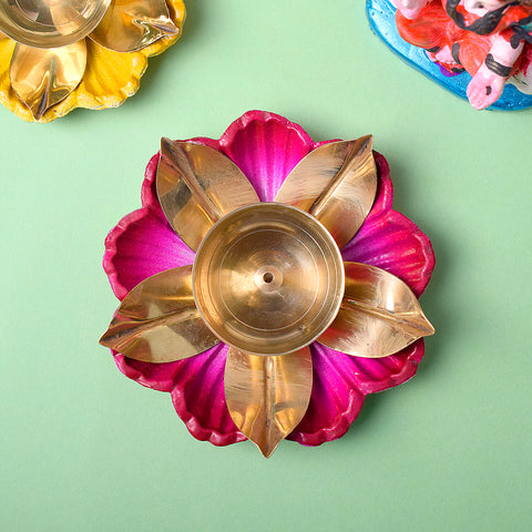 Beautiful Brass Amayra Lotus Diya in pink color, lotus-shaped oil lamp designed for pooja and festive decoration, handcrafted with elegant detailing and traditional style. India’s Largest Pooja Accessories Brand – www.satvikworld.com

