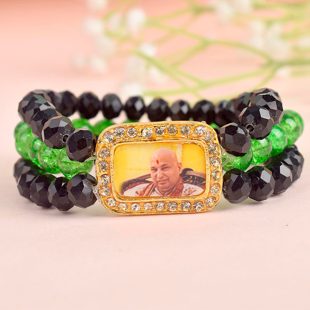 Black & Green Triple Layer Guruji Swaroop Bracelet featuring sleek black beads with vibrant green middle layer and Jai Guruji Swaroop – perfect for spiritual wear, meditation, and gifting. India’s Largest Pooja Accessories Brand – www.satvikworld.com