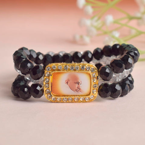 Black & Grey Triple Layer Guruji Swaroop Bracelet featuring sleek black beads with a sophisticated grey middle layer and Jai Guruji Swaroop – perfect for spiritual wear, meditation, and gifting. India’s Largest Pooja Accessories Brand – www.satvikworld.com