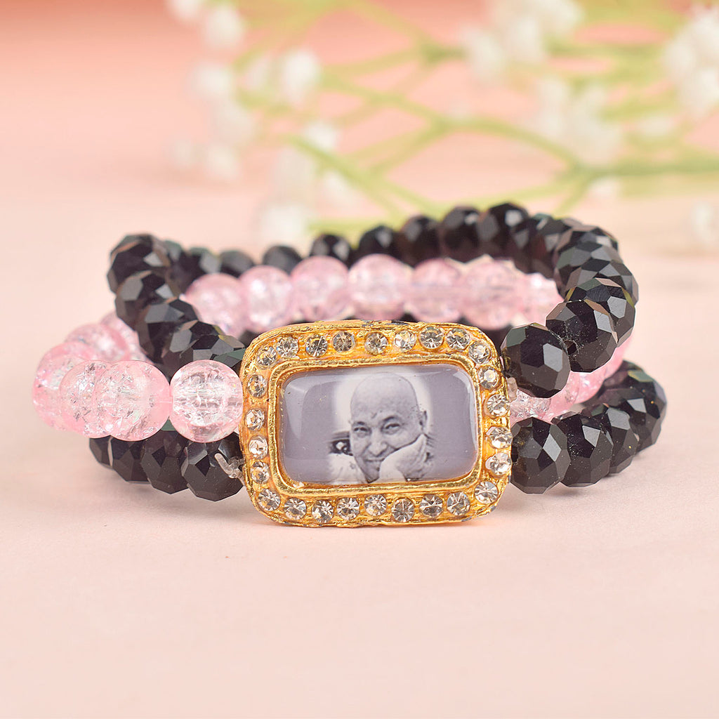 Black & Pink Triple Layer Guruji Swaroop Bracelet featuring sleek black beads with a vibrant pink middle layer and Jai Guruji Swaroop – perfect for spiritual wear, meditation, and gifting. India’s Largest Pooja Accessories Brand – www.satvikworld.com
