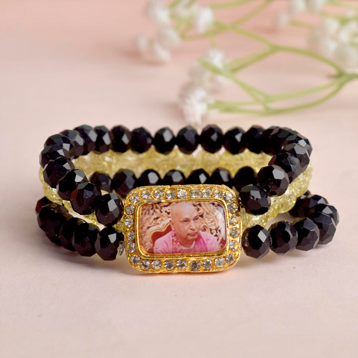 Black & Yellow Triple Layer Guruji Swaroop Bracelet featuring sleek black beads and a vibrant yellow middle layer with Jai Guruji Swaroop – perfect for spiritual wear, meditation, and gifting. India’s Largest Pooja Accessories Brand – www.satvikworld.com