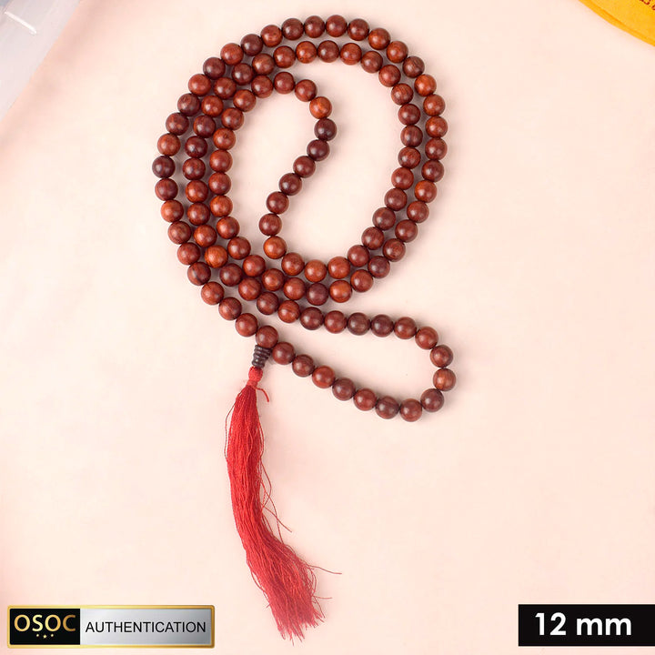 Certified 12mm 100% original authentic red sandalwood (Chandan) jap mala from Andhra Pradesh, featuring large polished beads for meditation, chanting, and spiritual rituals.India’s Premium Jap Mala Store - www.satvikworld.com