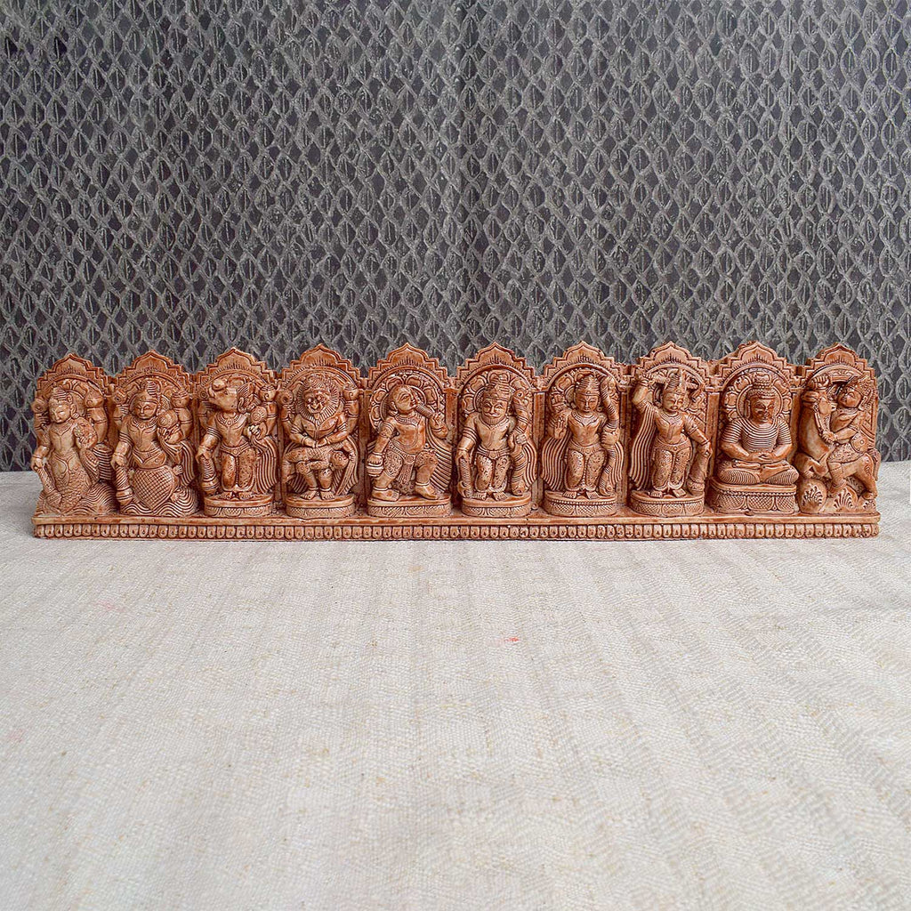 Handcrafted wooden Dasavatharam wall decor featuring the ten avatars of Lord Vishnu, intricately carved and painted, ideal for spiritual and aesthetic home decoration. India’s Largest Pooja Accessories Brand - www.satvikworld.com
