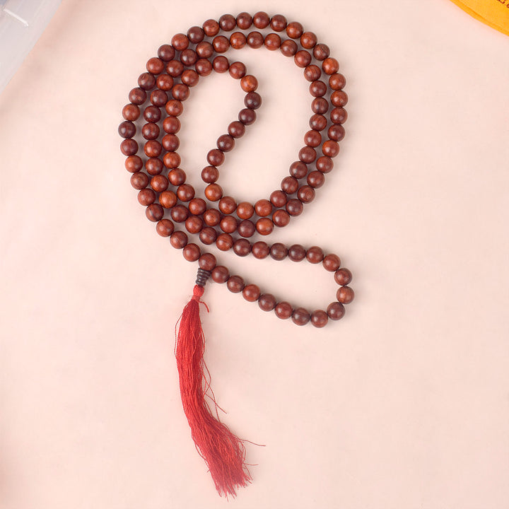 Certified 12mm 100% original authentic red sandalwood (Chandan) jap mala from Andhra Pradesh, featuring large polished beads for meditation, chanting, and spiritual rituals.India’s Premium Jap Mala Store - www.satvikworld.com