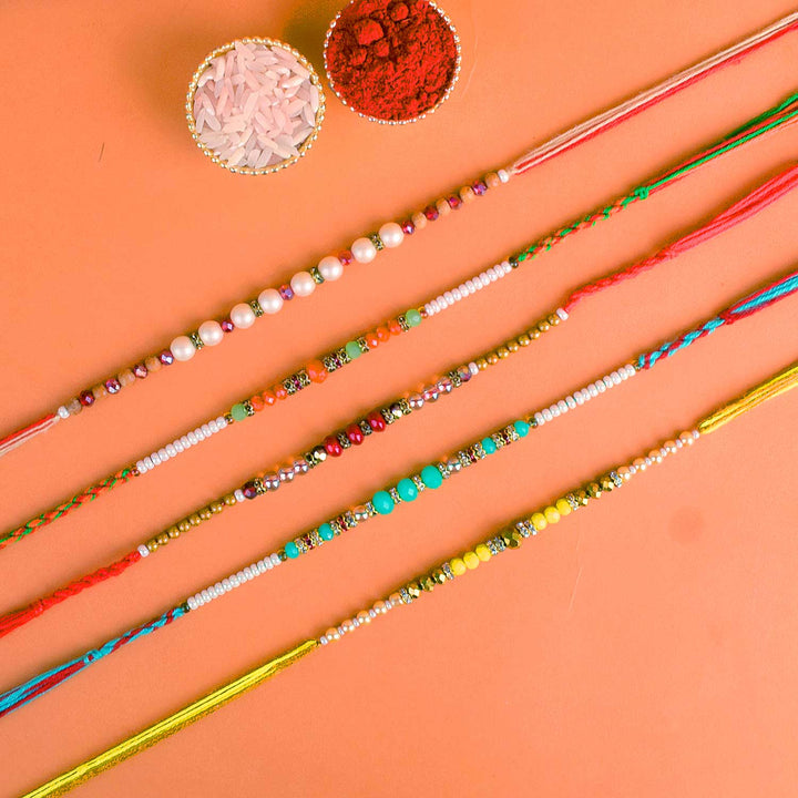 Set of 5 Designer Rakhi Threads with Roli Chawal and Ram Sita Stickers for Raksha Bandhan Celebration. India’s Largest Pooja Accessories Brand - www.satvikworld.com