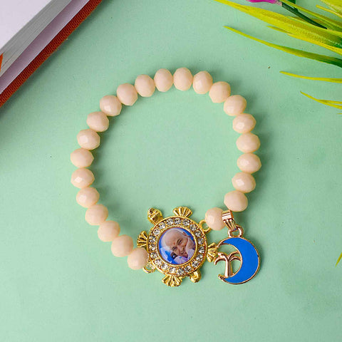 Guruji Swaroop Bracelet featuring colourful assorted beads with charms – handmade spiritual accessory perfect for pooja, gifting, and daily devotion. Satvikworld.com