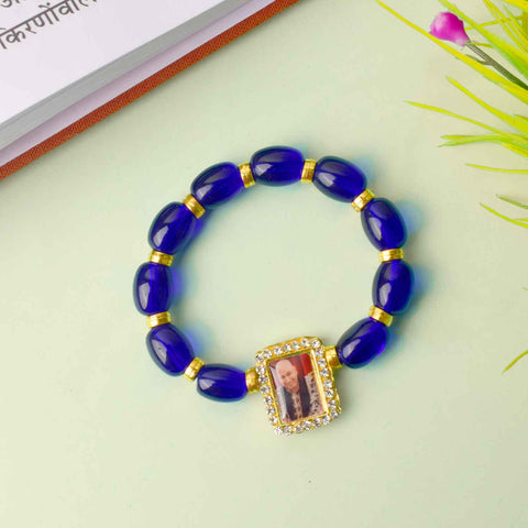 Guruji Swaroop Bracelet with radiant blue and golden beads – spiritual bracelet for pooja, gifting, satsangs, and daily wear. Satvikworld.com