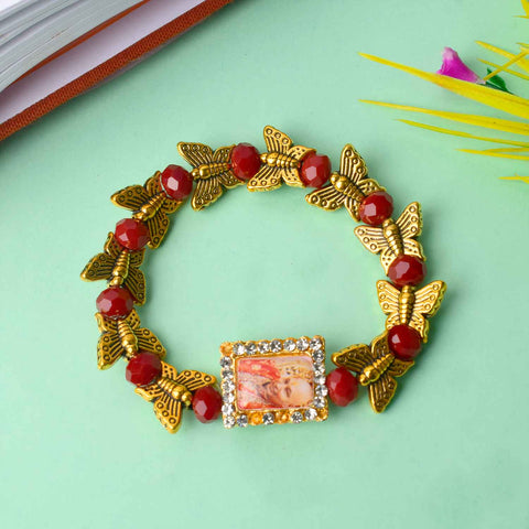 Handcrafted Guruji Swaroop Bracelet with golden butterfly charms and black-red colored beads, ideal for spiritual wear and gifting. India’s Largest Pooja Accessories Brand – www.satvikworld.com