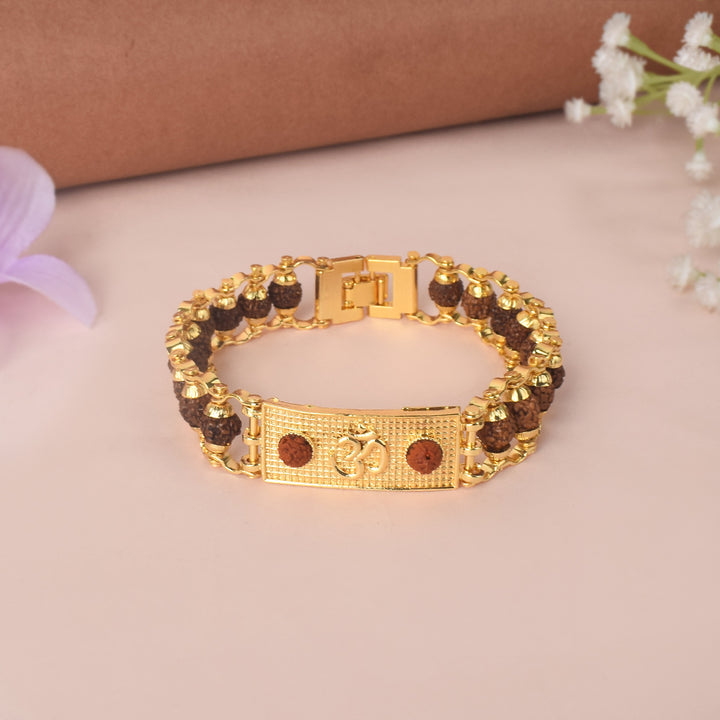 PVD Gold Plated Rudraksha Bracelet with Om symbol for divine blessings and positive energy. India’s Largest Pooja Accessories Brand - www.satvikworld.com