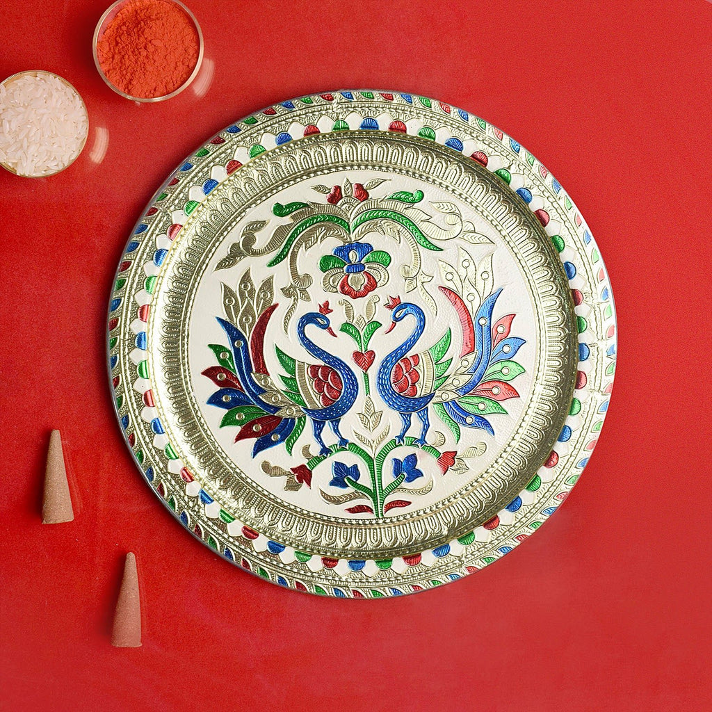 Peacock Embossed Puja Thali featuring traditional motifs, perfect for Diwali, Karwa Chauth, and festive rituals, designed to enhance the beauty of your puja setup.India’s Largest Pooja Accessories Brand – www.satvikworld.com








