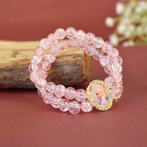 Pink Shiny Beads Double Layer Guruji Swaroop Bracelet featuring two layers of delicate pink beads and Jai Guruji Swaroop – perfect for spiritual wear, festive gifting, and daily devotion. India’s Largest Pooja Accessories Brand – www.satvikworld.com