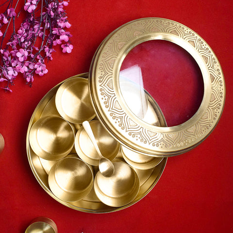 Premium brass pooja samagridaan set with 7 containers, a spoon, and a transparent glass lid, ideal for neatly organizing sacred items during rituals. India’s Largest Pooja Accessories Brand – www.satvikworld.com
