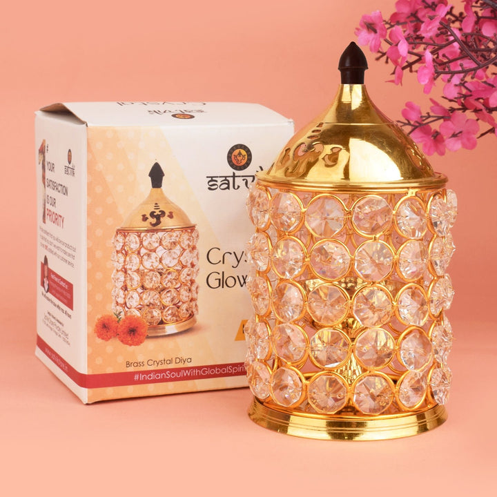 Pure Brass Crystal Glow Chimney Diya, featuring a radiant crystal-like glow with an elegant chimney design, perfect for enhancing spiritual ambiance during pooja ceremonies. India’s Largest Pooja Accessories Brand – www.satvikworld.com