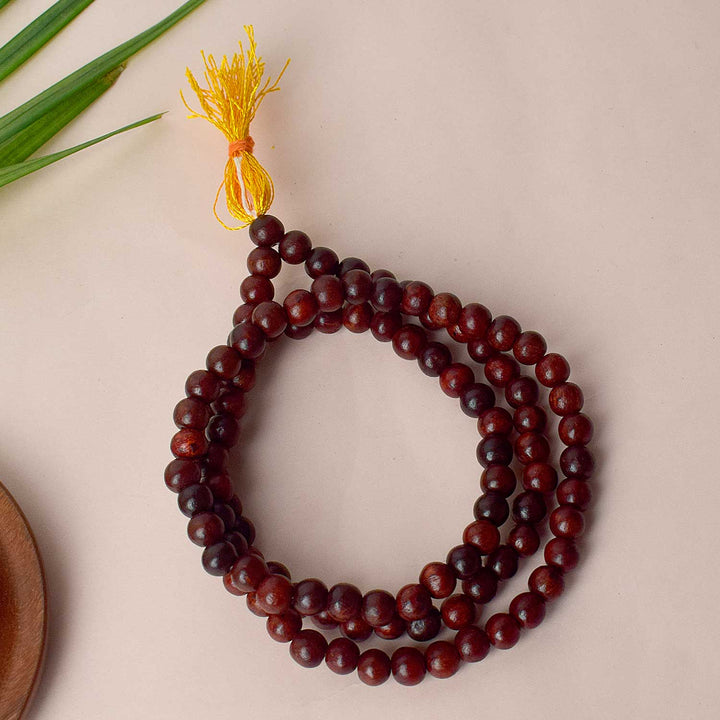 Regular Red Sandalwood/Chandan Scented Jap Mala with 108+1 beads, ideal for meditation and spiritual practices, offering a calming and fragrant aroma to enhance your devotion. India’s Largest Pooja Accessories Brand – www.satvikworld.com