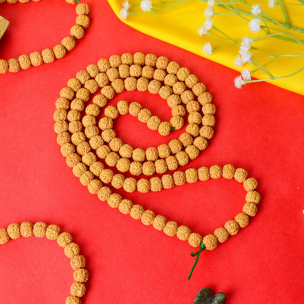 Semi Pathariya Rudraksha Mala with natural brown beads for meditation and spiritual chanting. India’s Premium Rudraksha Jap Mala Store- www.satvikworld.com
