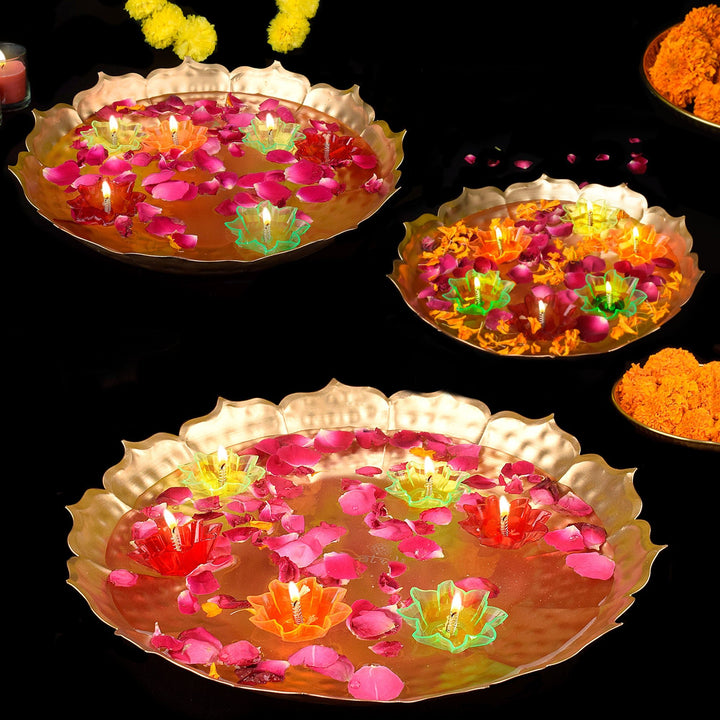 Set of 3 beautifully crafted metal lotus-shaped urlis with floating diyas, perfect for traditional home decor, pooja setup, and festive celebrations.India’s Largest Pooja Accessories Brand – www.satvikworld.com 