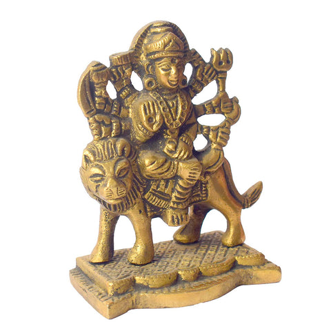 3.1-inch Sherawali Mata idol crafted from brass, featuring the goddess majestically seated on a lion with finely detailed ornaments and weapons, placed on a decorative base—ideal for invoking divine strength and blessings in home or car settings. India’s Largest Pooja Accessories Brand- www.satvikworld.com