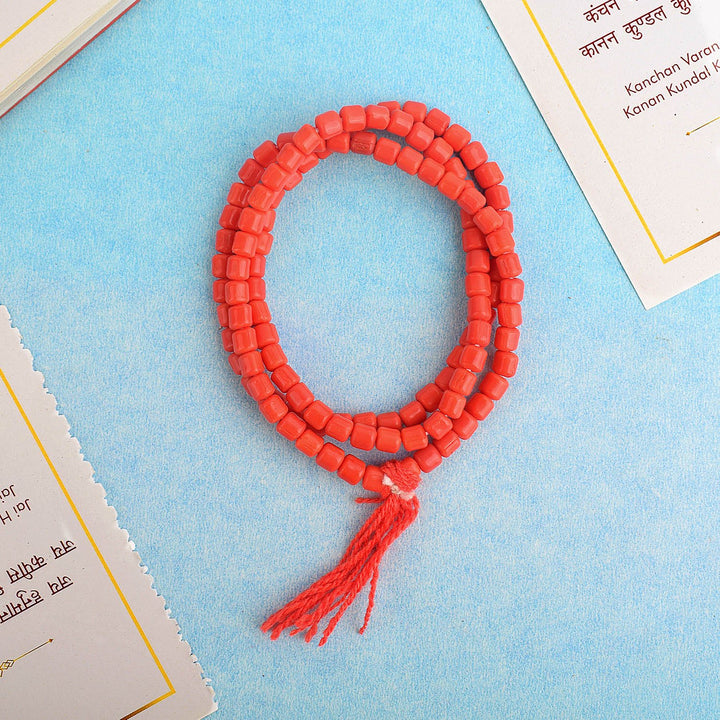 Synthetic Lal Munga (Blood Stone) Mala with Small Beads, ideal for meditation, mantra chanting, and spiritual rituals. The red bloodstone beads are known for enhancing courage and vitality. India’s Largest Pooja Accessories Brand – www.satvikworld.com