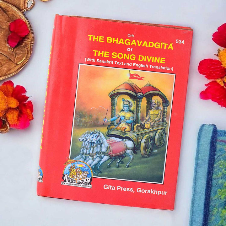 Image of the "The Bhagwad Gita or The Song Divine" book cover, depicting the divine teachings of Lord Krishna, an essential scripture of Hindu philosophy that imparts wisdom on duty, righteousness, and spirituality. India’s Largest Pooja Accessories Brand – www.satvikworld.com