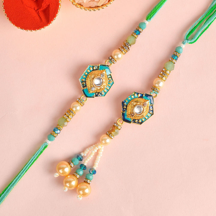 Designer Couple Rakhi Set for Bhaiya and Bhabhi with Roli Chawal and Ram Sita Stickers – Raksha Bandhan Gift Combo. India’s Largest Brass Idols Brand - www.satvikworld.com