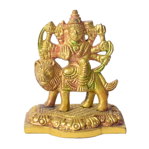 2.8-inch Sherawali Mata idol crafted in brass with vibrant hand-painted colors, depicting the goddess seated on a lion with detailed ornaments and weapons—bringing divine blessings, strength, and protection to home or car interiors. India’s Largest Pooja Accessories Brand- www.satvikworld.com