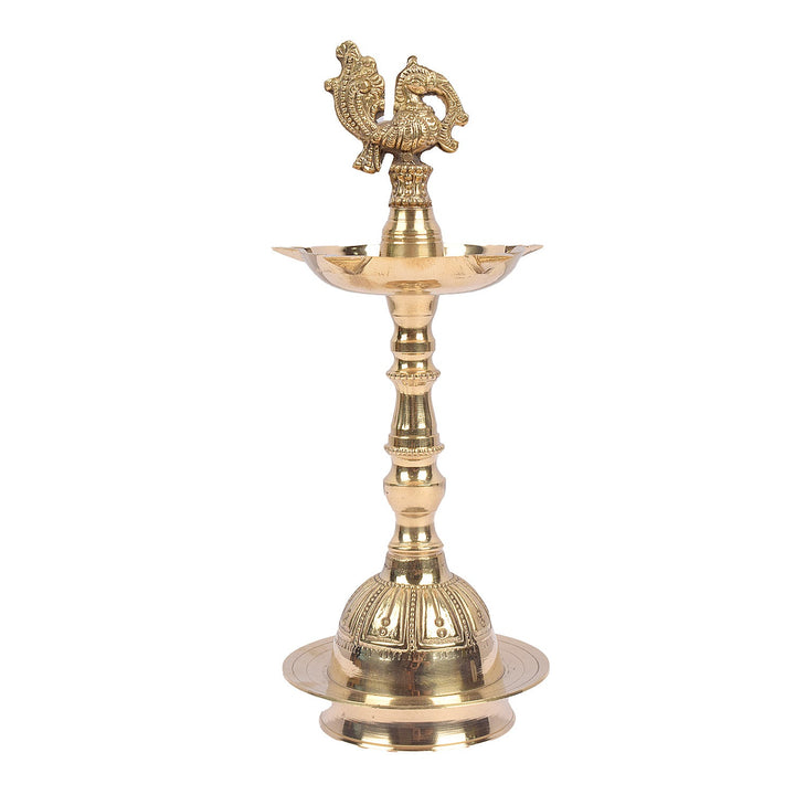 9.5 Inch Embossed Brass Peacock Kerala Samai Diya – A beautiful 9.5-inch brass diya with an embossed peacock design, perfect for spiritual ceremonies and enhancing sacred spaces. India’s Largest Pooja Accessories Brand – www.satvikstore.in