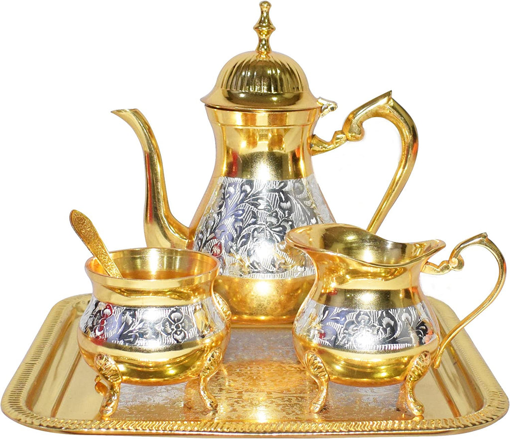Antique Mughal-style brass tea and coffee set in gold and silver finish with intricate engraving. India’s Largest Pooja Accessories Brand – www.satvikworld.com

 