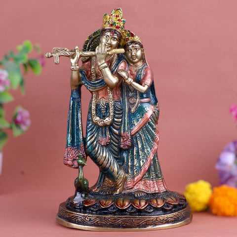 Attractive Radha Krishna With Flute/Bansuri Brass Idol, A Stunning Piece of Art Depicting Lord Krishna Playing His Flute, with Radha by His Side. This Exquisite Brass Idol Captures the Divine Essence of Their Eternal Love and Devotion. The Detailed Craftsmanship and Graceful Posing Make It a Perfect Addition to Your Home Temple or Spiritual Decor. India’s Largest Pooja Accessories Brand – www.satvikworld.com