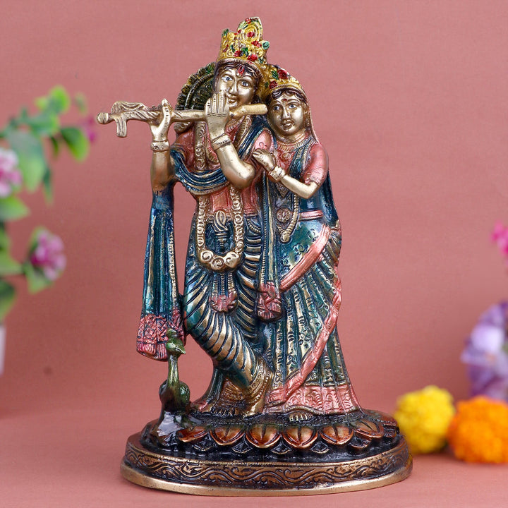 Attractive Radha Krishna With Flute/Bansuri Brass Idol, A Stunning Piece of Art Depicting Lord Krishna Playing His Flute, with Radha by His Side. This Exquisite Brass Idol Captures the Divine Essence of Their Eternal Love and Devotion. The Detailed Craftsmanship and Graceful Posing Make It a Perfect Addition to Your Home Temple or Spiritual Decor. India’s Largest Pooja Accessories Brand – www.satvikworld.com