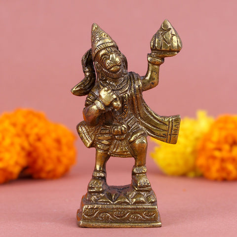 Brass Hanuman idol depicting Lord Hanuman heroically carrying the Sanjeevani mountain in one hand, with intricate detailing and dynamic posture—symbolizing strength, devotion, and divine courage, ideal for home temples or spiritual décor. India’s Largest Pooja Accessories Brand- www.satvikworld.com