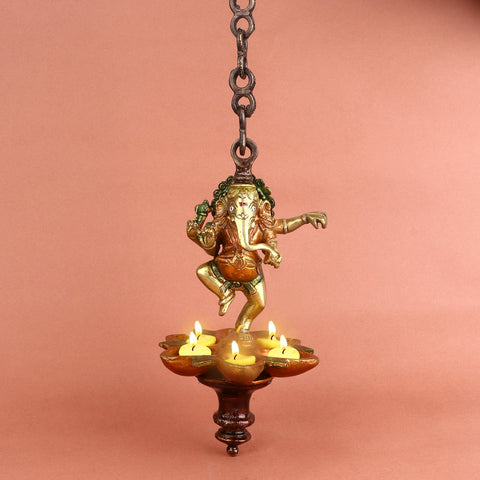 Dancing Ganesha Panchmukhi Hanging Diya, featuring an elegant design with five wicks and intricate details of Lord Ganesha in a dancing posture, perfect for religious ceremonies and home decoration. India’s Largest Pooja Accessories Brand – www.satvikworld.com