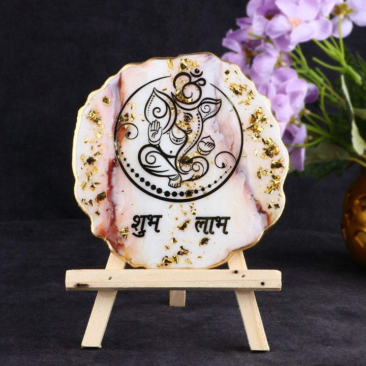 Decorative Ganesha Shubh Labh frame with stand made using epoxy resin, featuring vibrant colors and traditional design for auspicious home or office decor.India’s Largest Pooja Accessories Brand – www.satvikworld.com