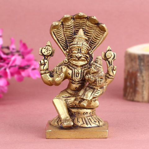 Brass Narsimha Laxmi idol, featuring Lord Narsimha in a powerful and protective stance with Goddess Lakshmi by his side, symbolizing strength, protection, and prosperity. Perfect for spiritual décor and worship. India’s Largest Pooja Accessories Brand – www.satvikworld.com