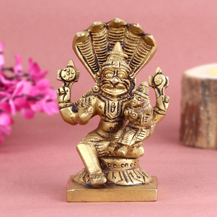 Brass Narsimha Laxmi idol, featuring Lord Narsimha in a powerful and protective stance with Goddess Lakshmi by his side, symbolizing strength, protection, and prosperity. Perfect for spiritual décor and worship. India’s Largest Pooja Accessories Brand – www.satvikworld.com